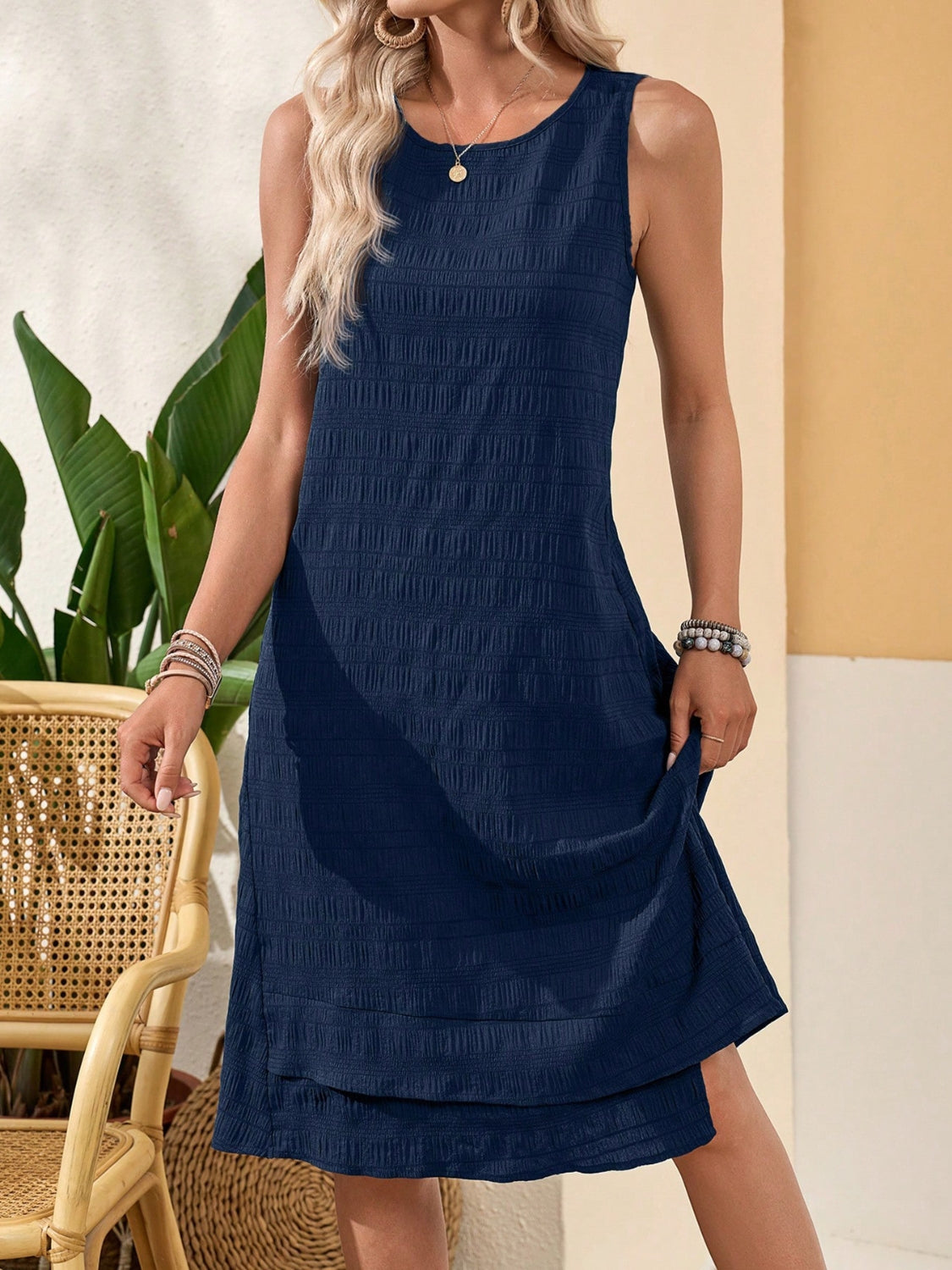 Ruffled Textured Round Neck Sleeveless Dress.