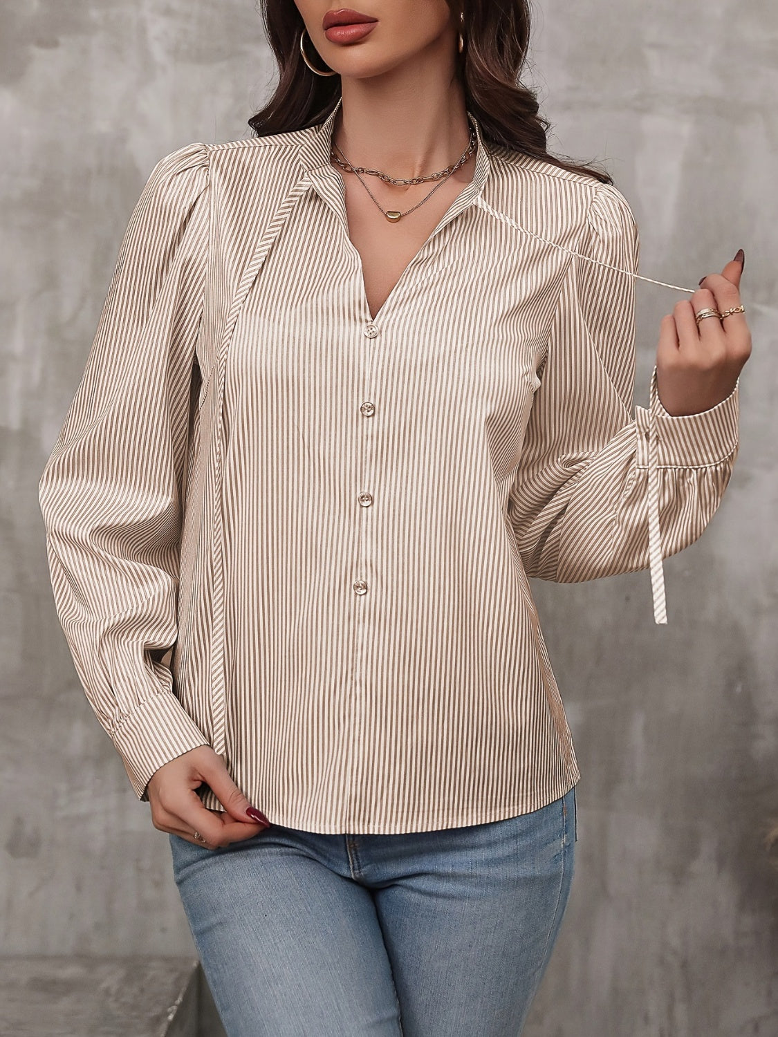 Striped Long Sleeve Blouse with Stylish Tie Detail.