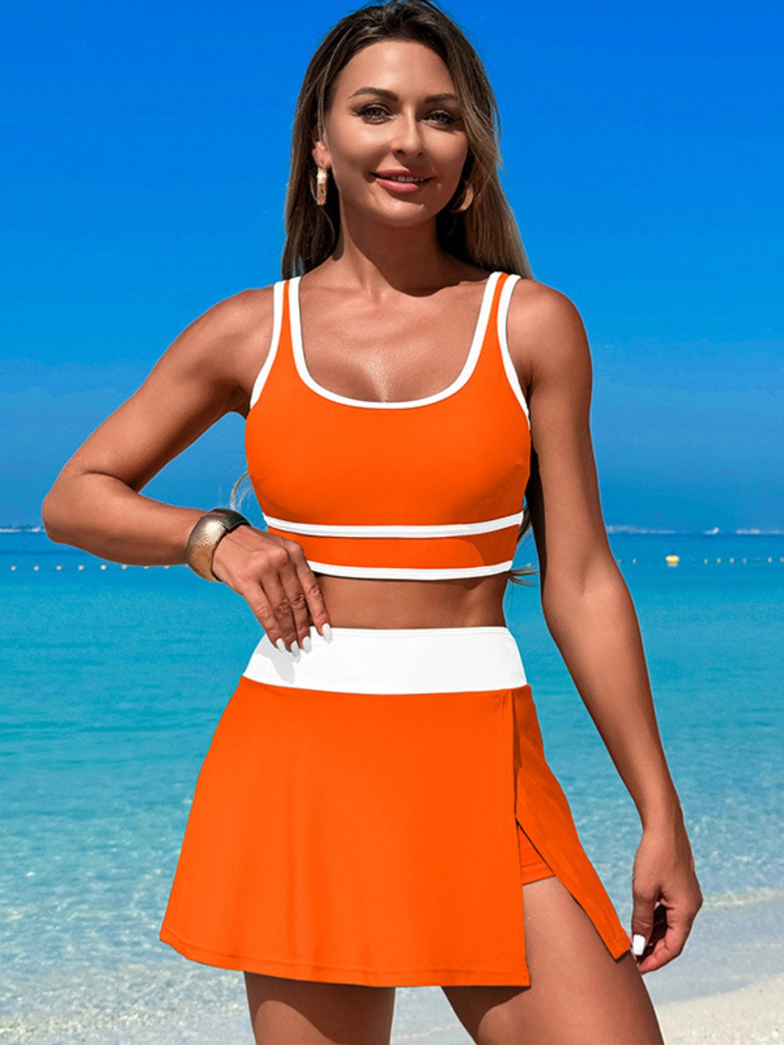Dive into Style: Scoop Neck Top and Skort Swim Set.
