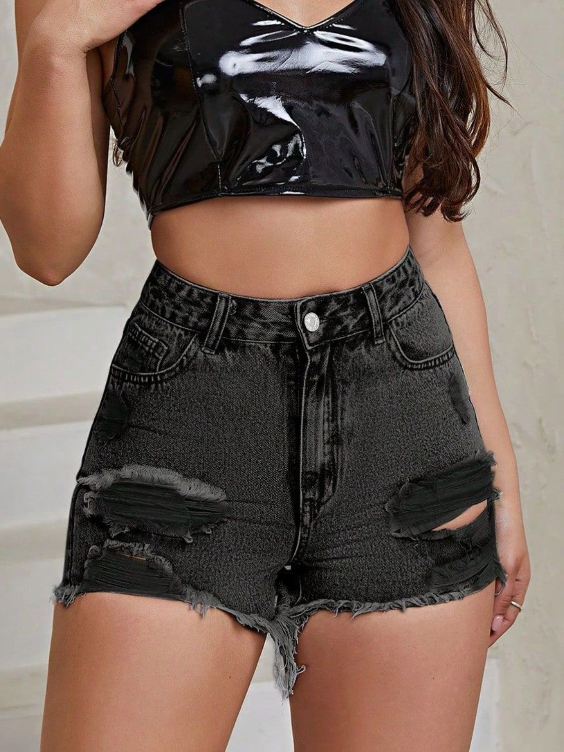 Distressed Raw Hem High Rise Denim Shorts.