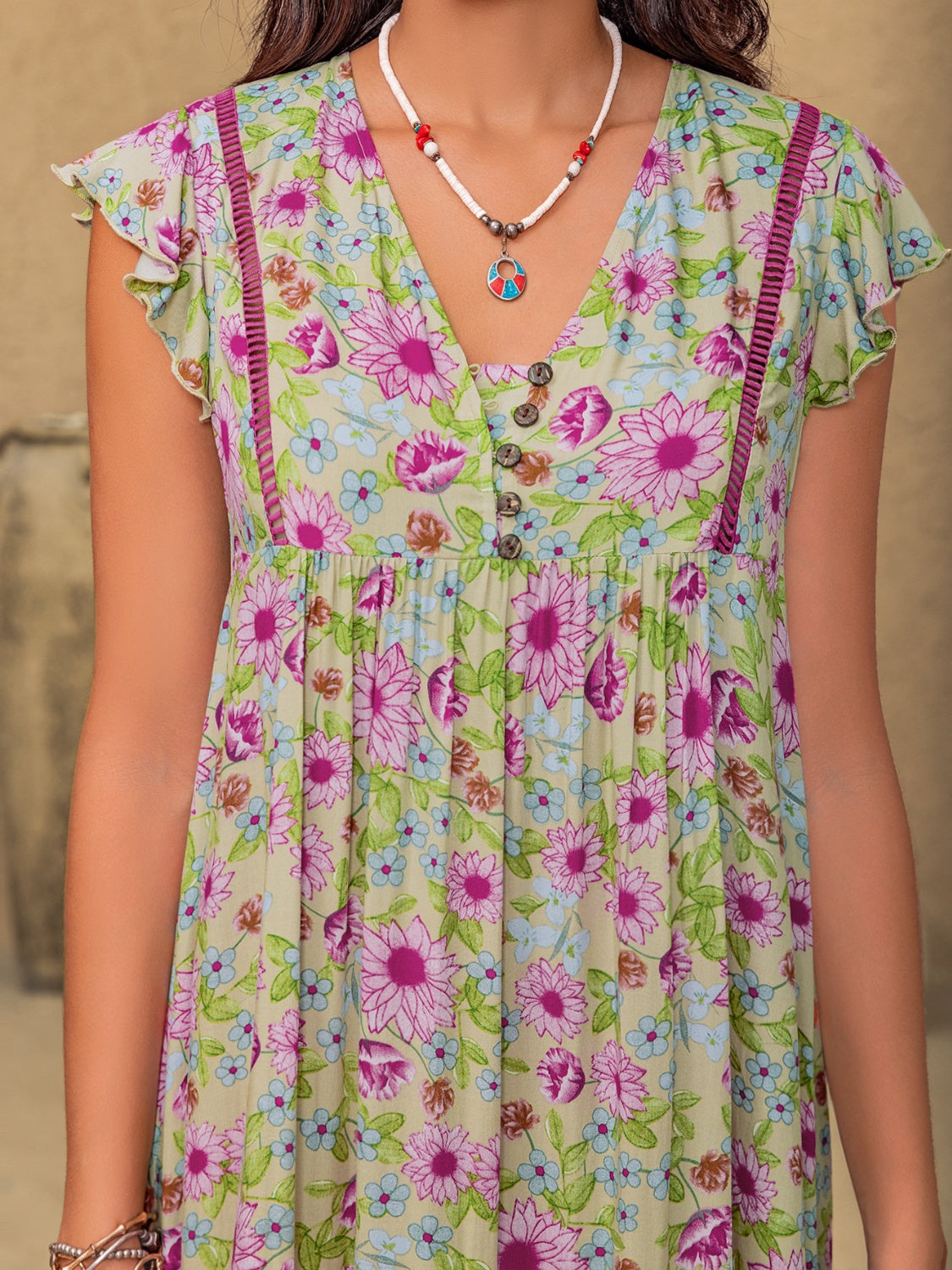 Floral Ruffled Cap Sleeve Tiered Dress.