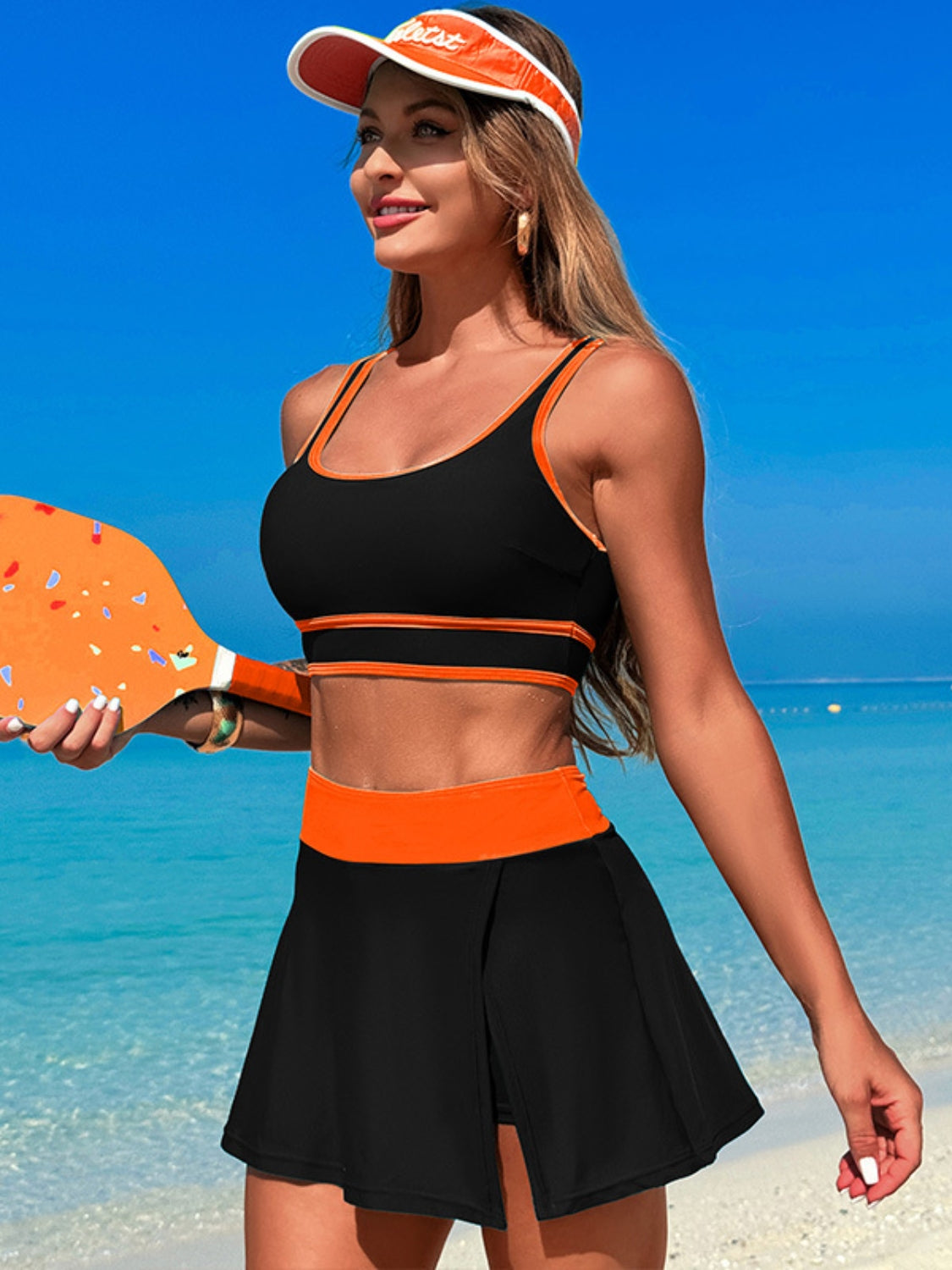 Dive into Style: Scoop Neck Top and Skort Swim Set.
