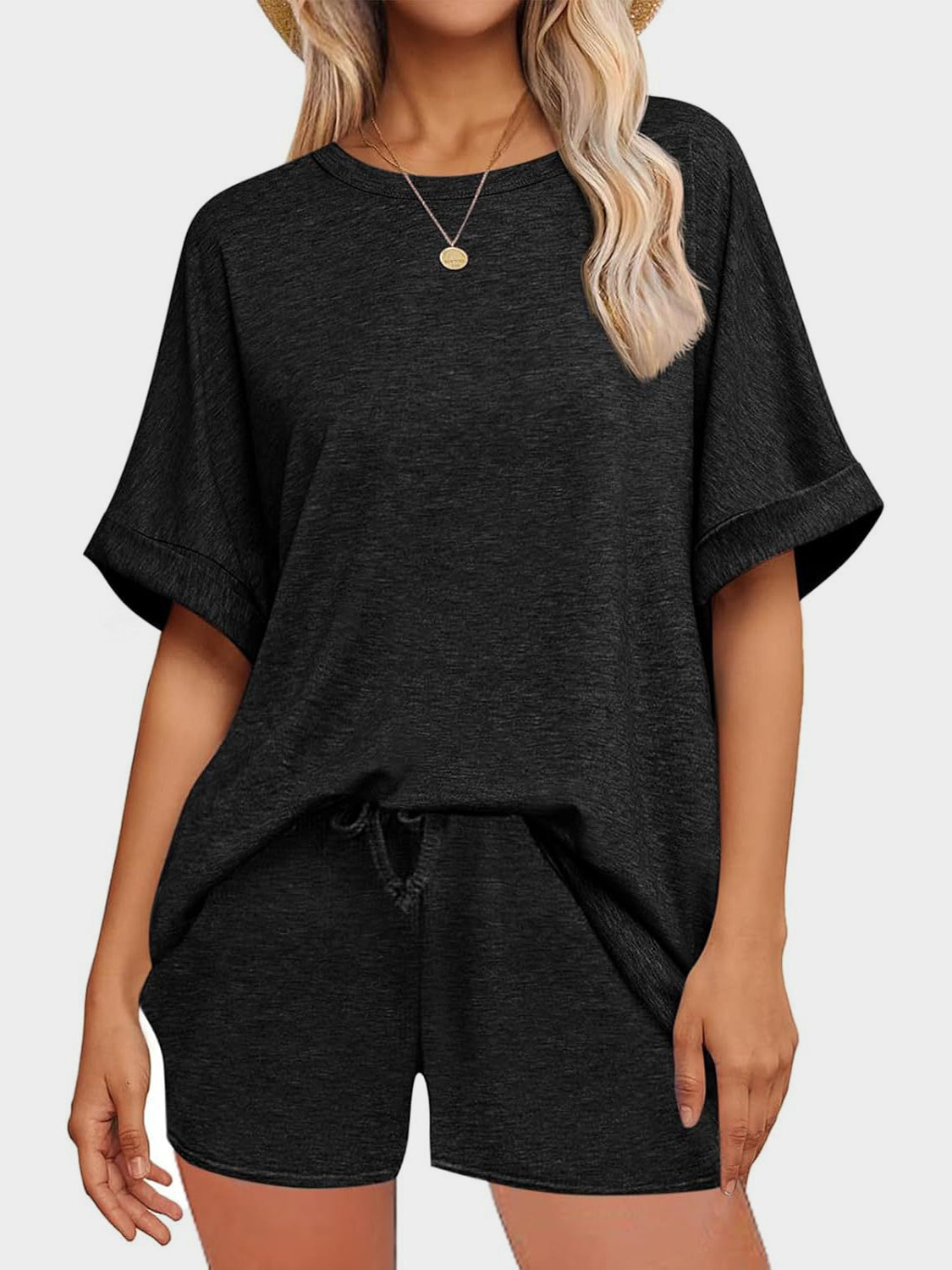 Comfortable and Stylish Round Neck T-Shirt and Drawstring Shorts Set.