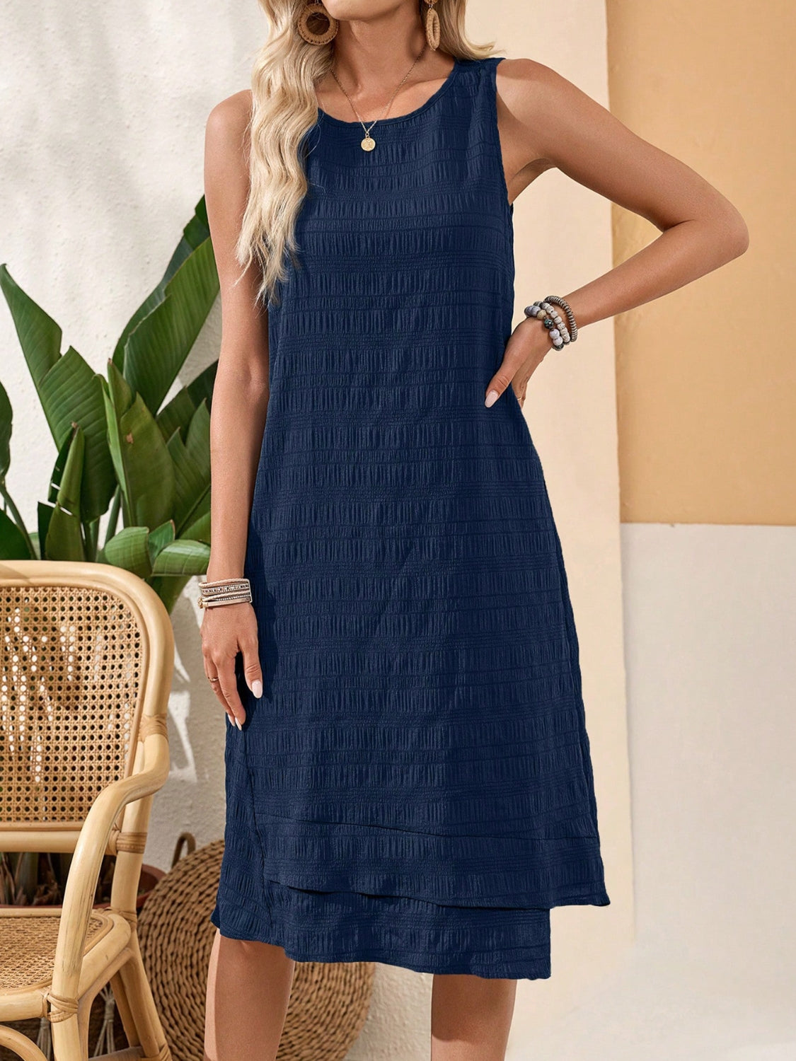 Ruffled Textured Round Neck Sleeveless Dress.