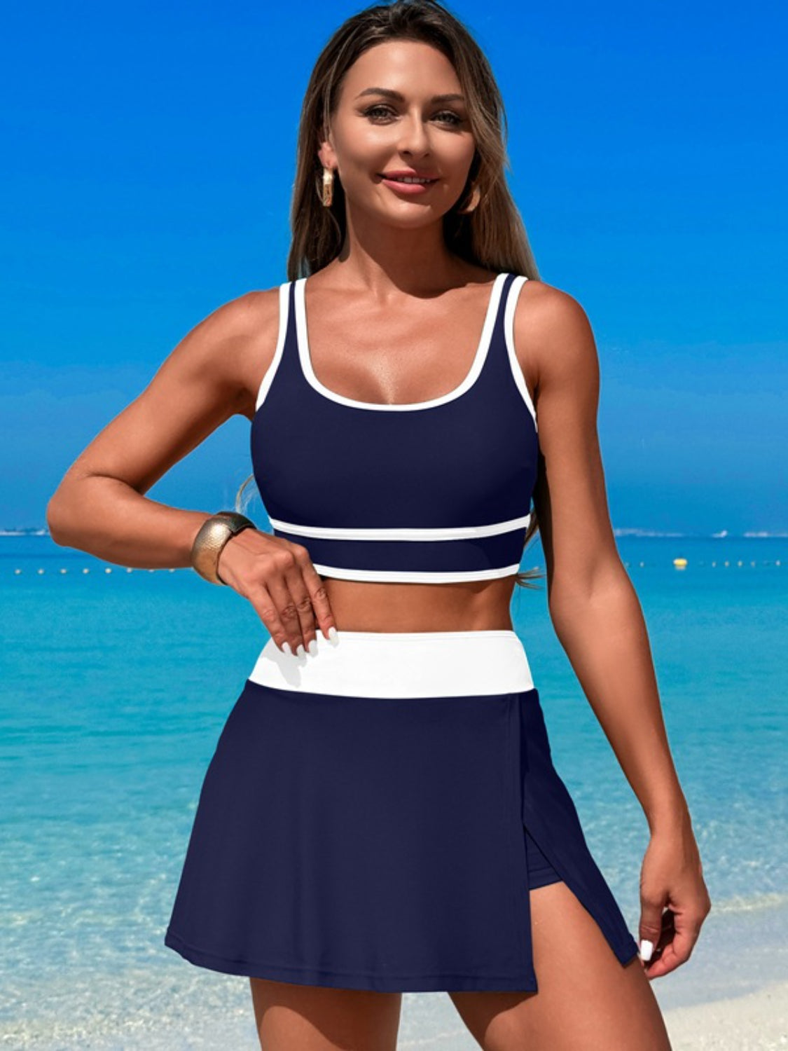 Dive into Style: Scoop Neck Top and Skort Swim Set.