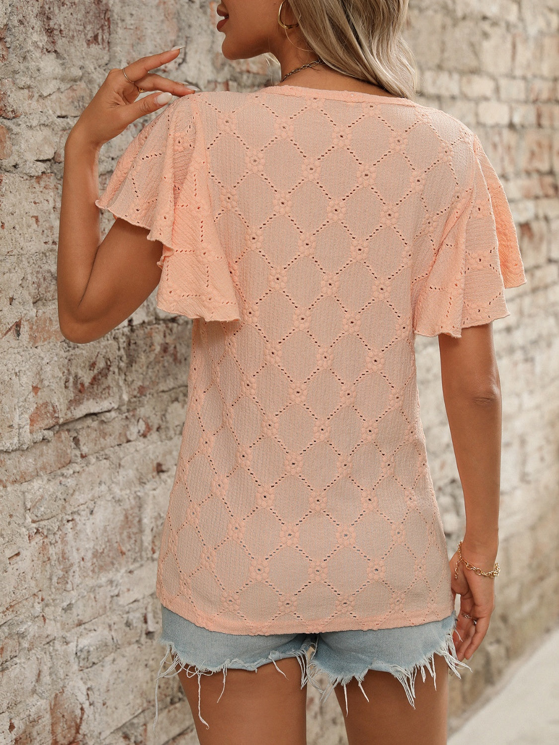Eyelet Round Neck Flutter Sleeve Top.