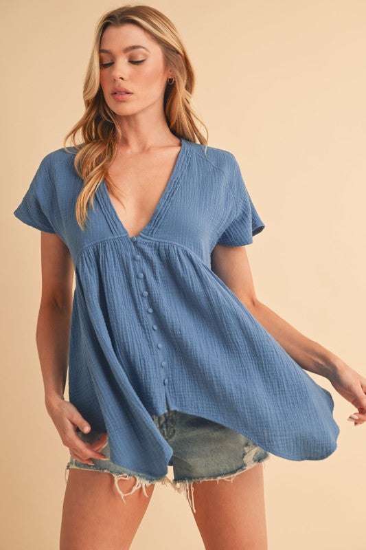 Aemi + Co Tuck Detail V-Neck Short Sleeve Blouse.